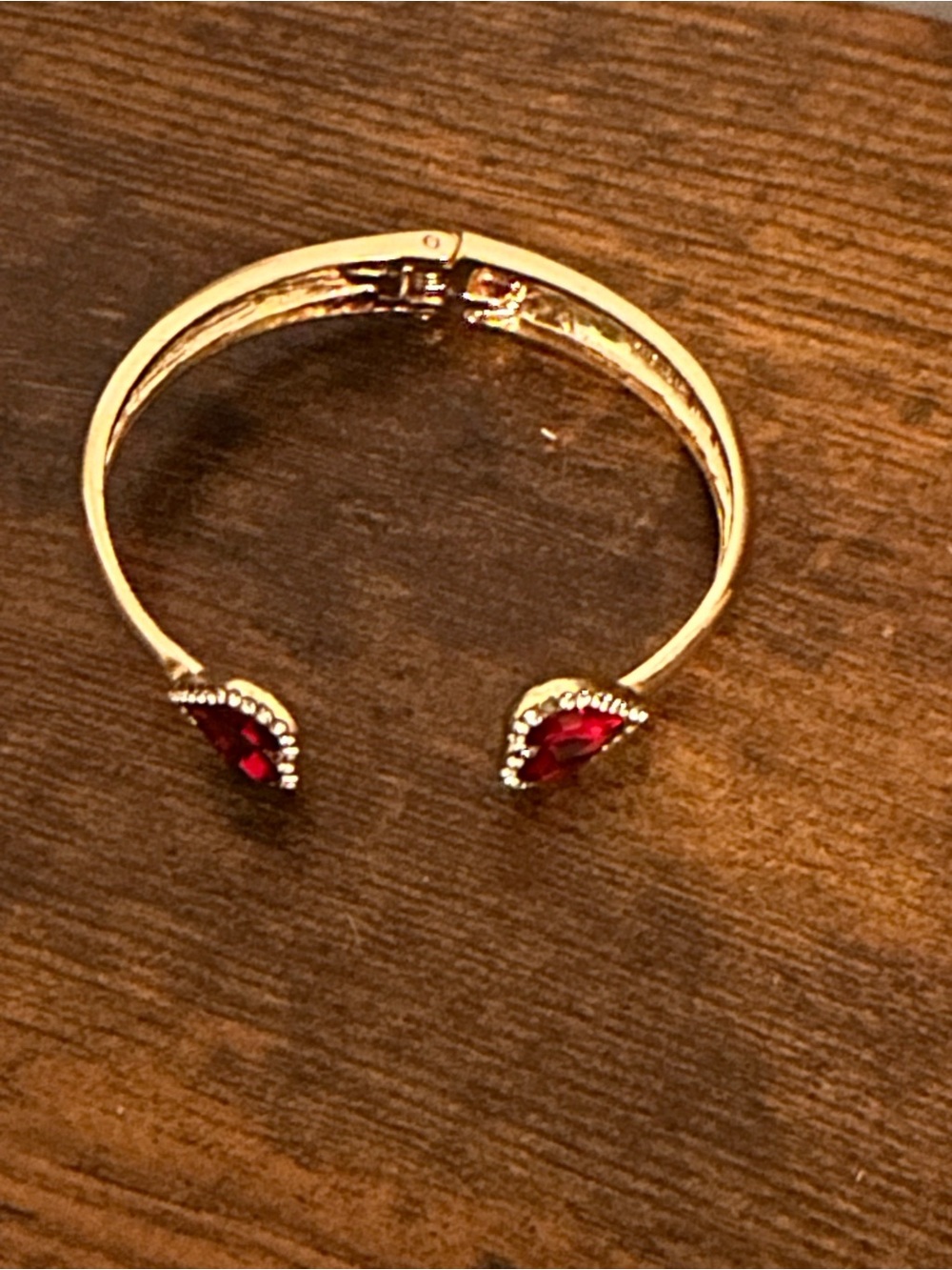 Gold Tone Open Cuff Bracelet with Red Teardrop Stones
